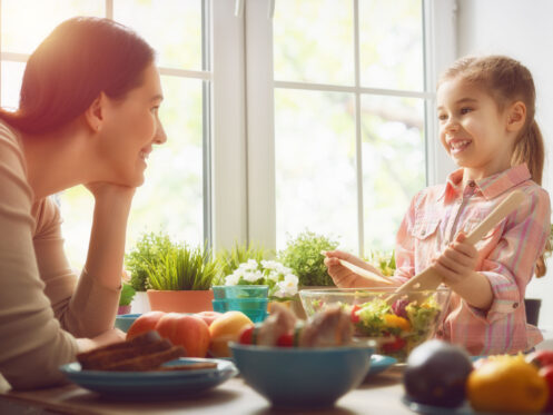 Mother and daughter in their Anaheim kitchen